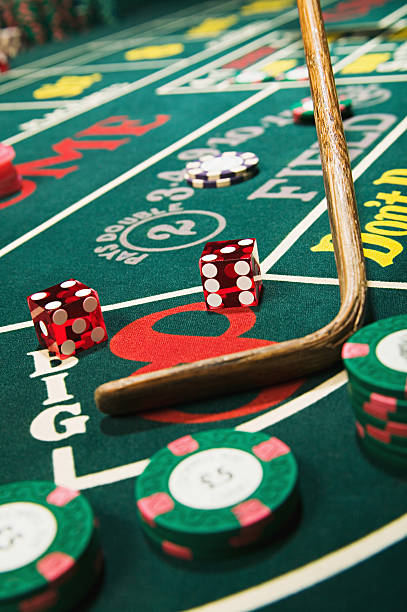 kumbang 4d app showing live blackjack and roulette tables on smartphone screen